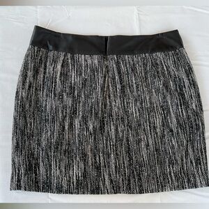 Calvin Klein mini skirt. Tweed and leather. Size 10 Wool blend.